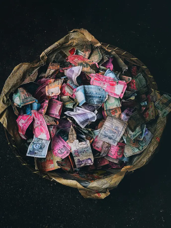 The dust-covered notes — perhaps once someone’s tomorrow. photography